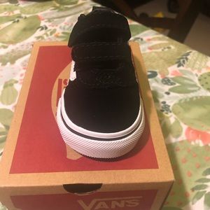 Brand new black baby vans size 2.5